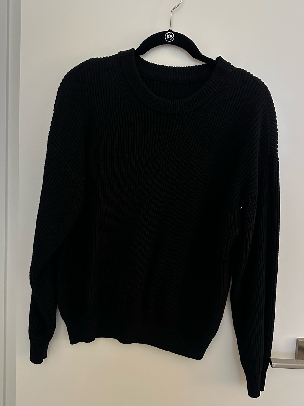 Woman’s Black Ribbed Crewneck Sweater
